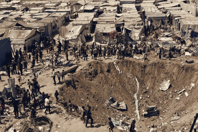 Israeli Strikes Kill Two, Destroy Tents in Gaza Camps