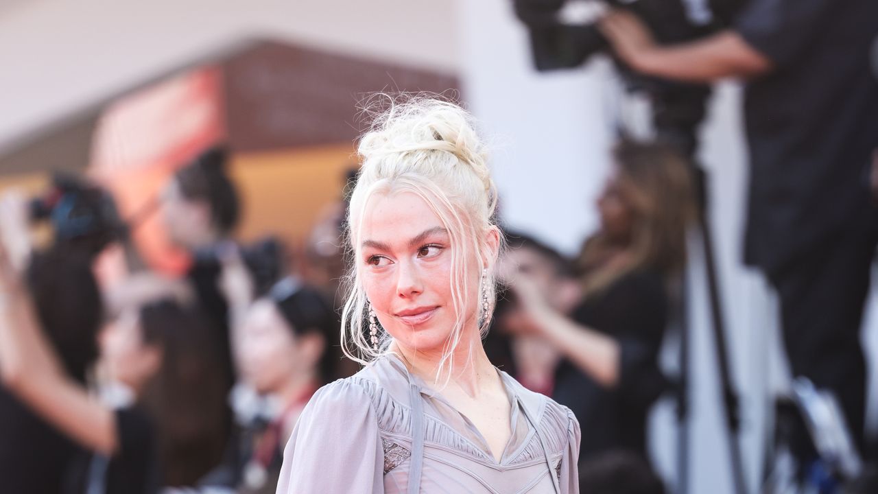 Phoebe Bridgers Challenges Red Carpet Grooming With Unshaven Legs at Venice