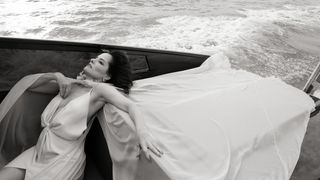 Image may contain Parker Posey Clothing Dress Fashion Formal Wear Gown Face Head Person Photography and Portrait