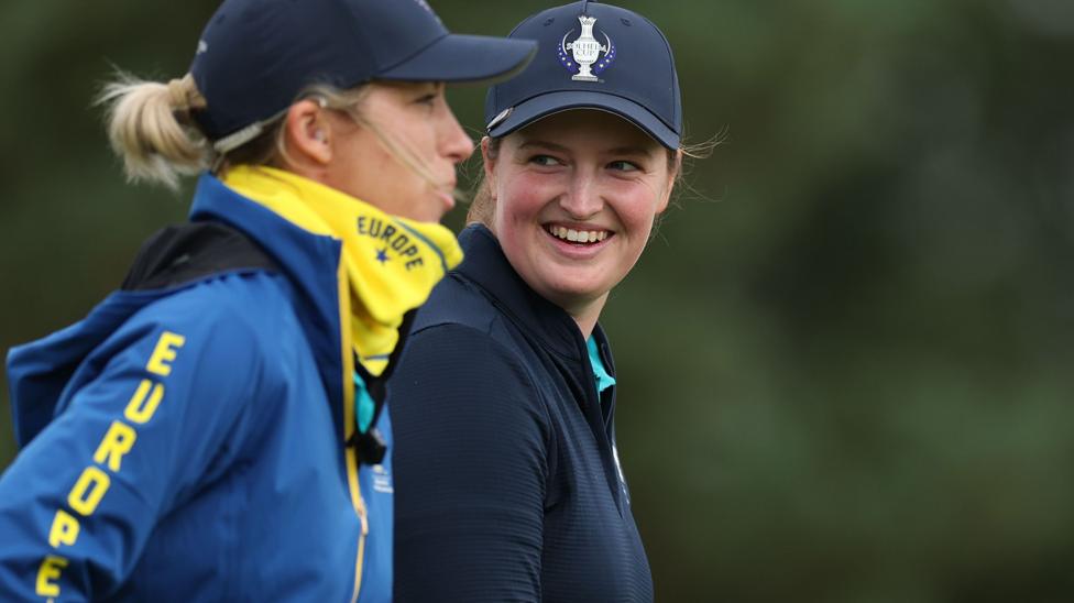 Lottie Woad speaking with Europe vice-captain and fellow Englishwoman Mel Reid at the Solheim Cup in the Netherlands