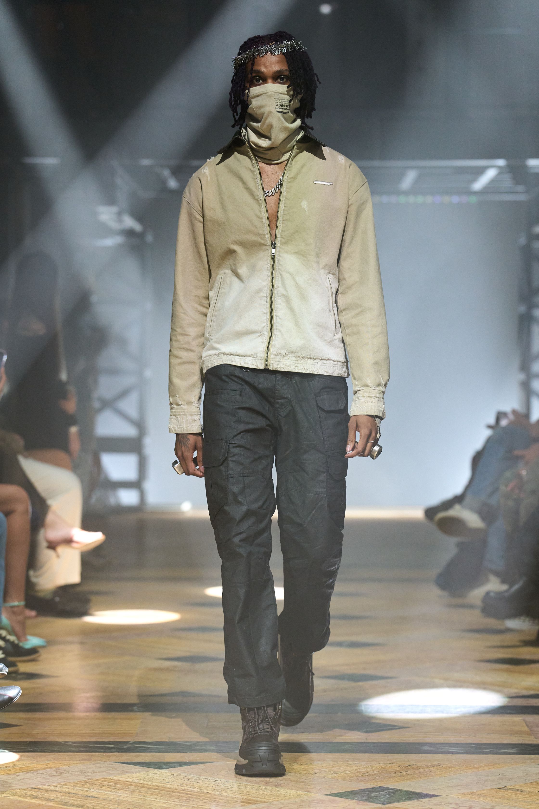 Image may contain Fashion Adult Person Clothing Footwear High Heel Shoe Coat Jacket Pants and Performer