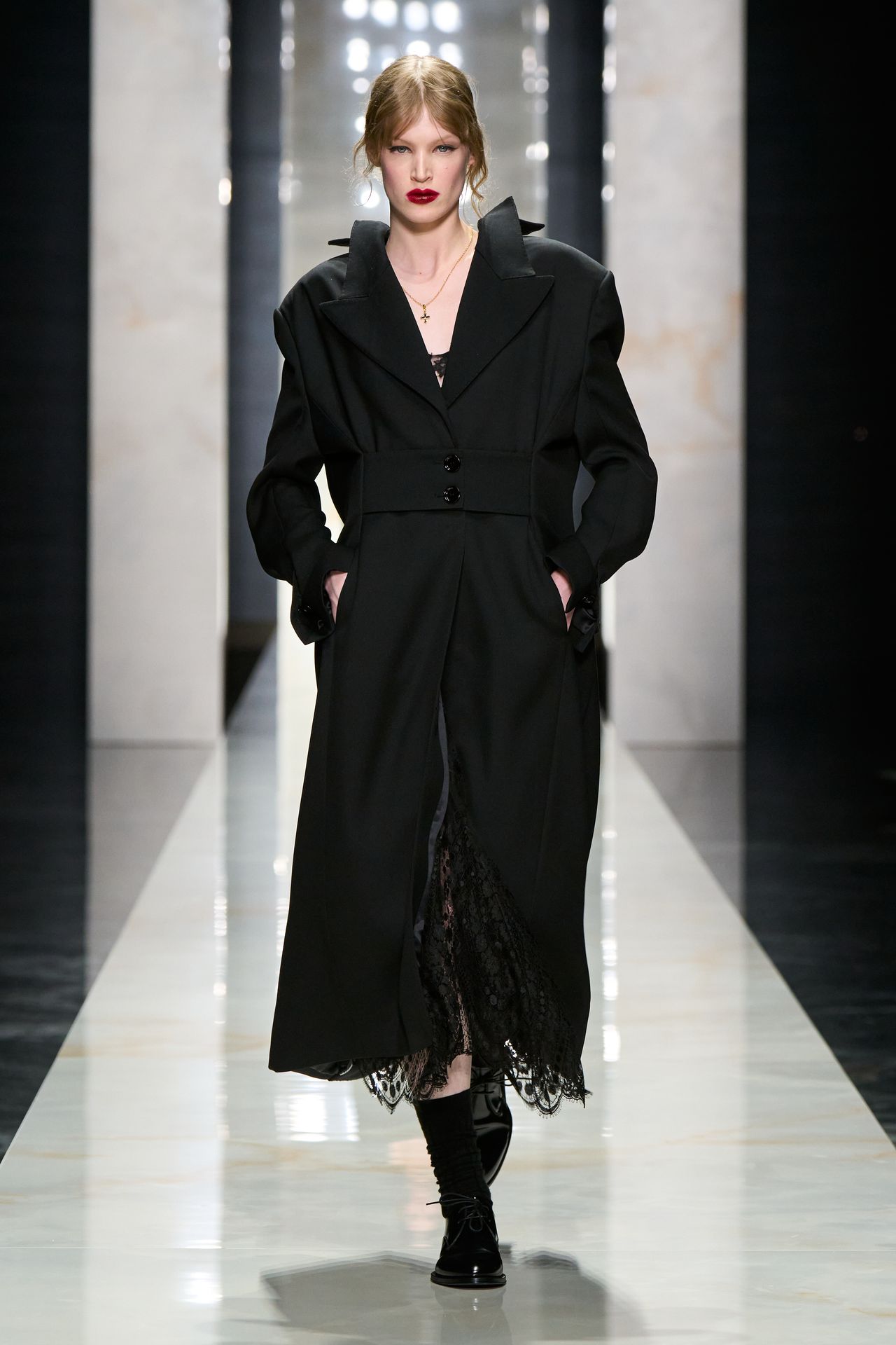 Image may contain Clothing Coat Overcoat Fashion and Person