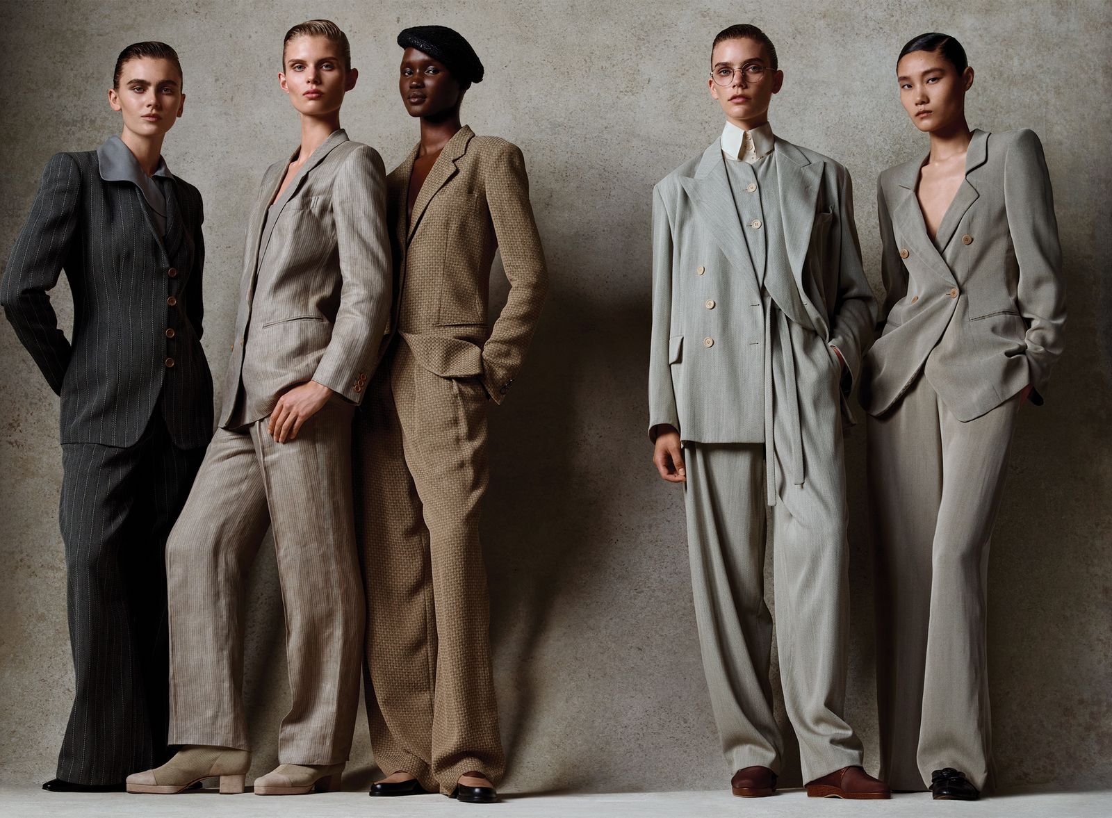 Image may contain Ataui Deng Clothing Formal Wear Suit Coat Jacket Adult Person Home Decor and Linen